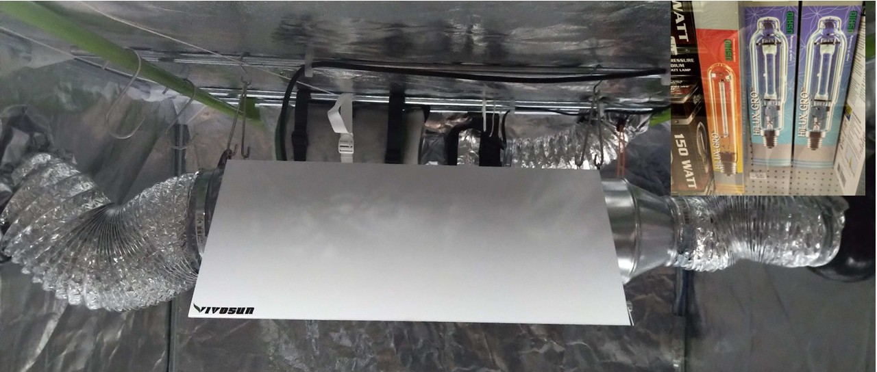 An HID light with cooling ducting attached. Bulbs also shown.