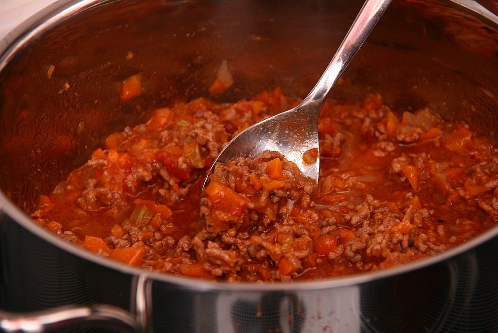 A pot with bolognese sauce