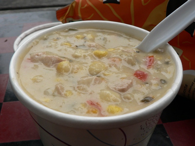 Chicken corn chowder in a to go cup.