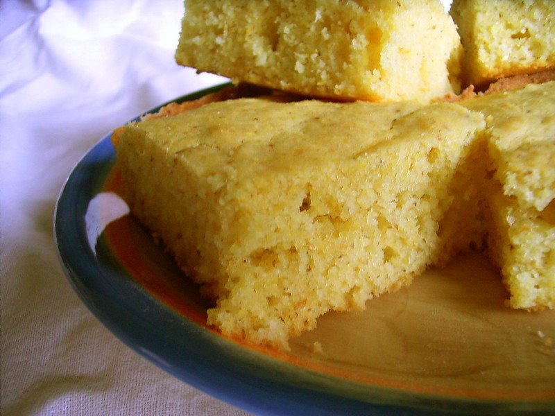 Slices of cornbread on a plate.