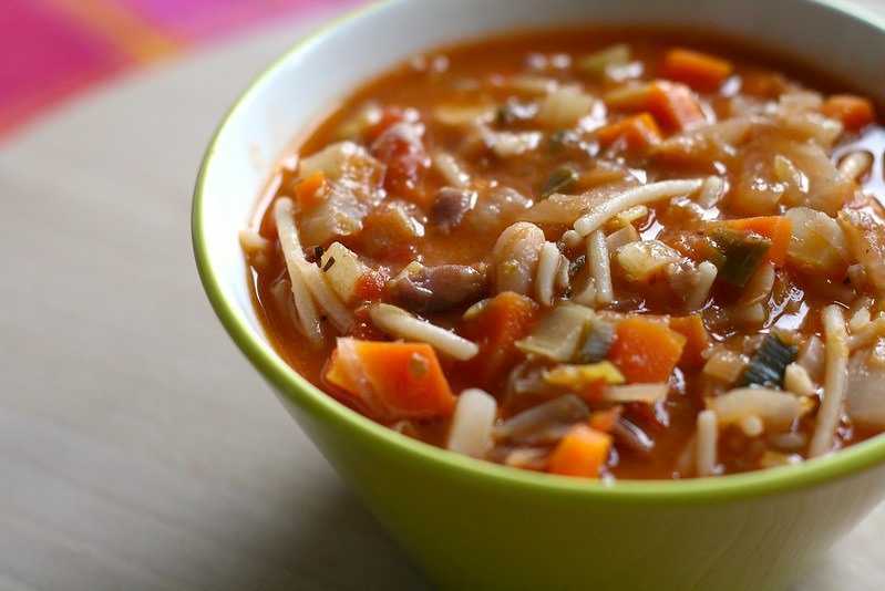 A bowl of minestrone soup.