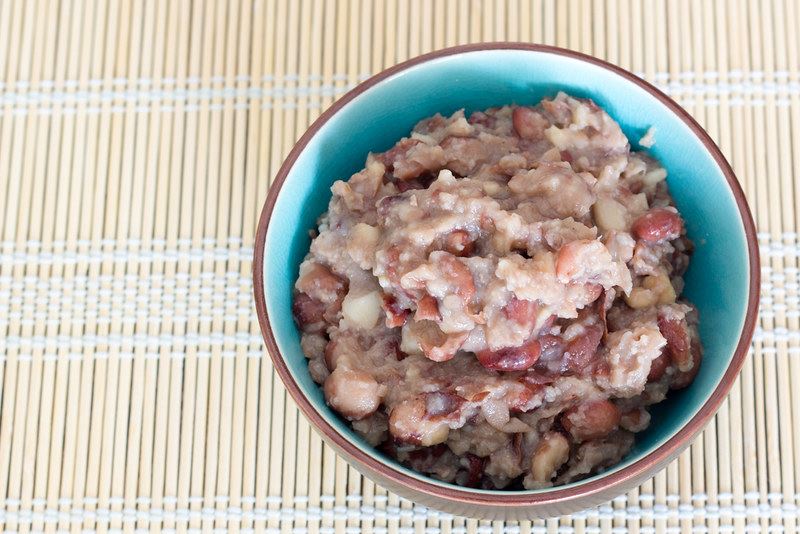 A bowl of refried beans.