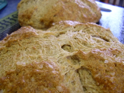 Two round loaves of crusty soda bread.