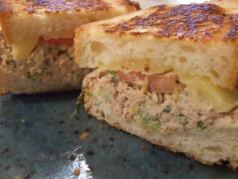 Tuna melt sandwiches, with tuna, tomato, and melted cheese.