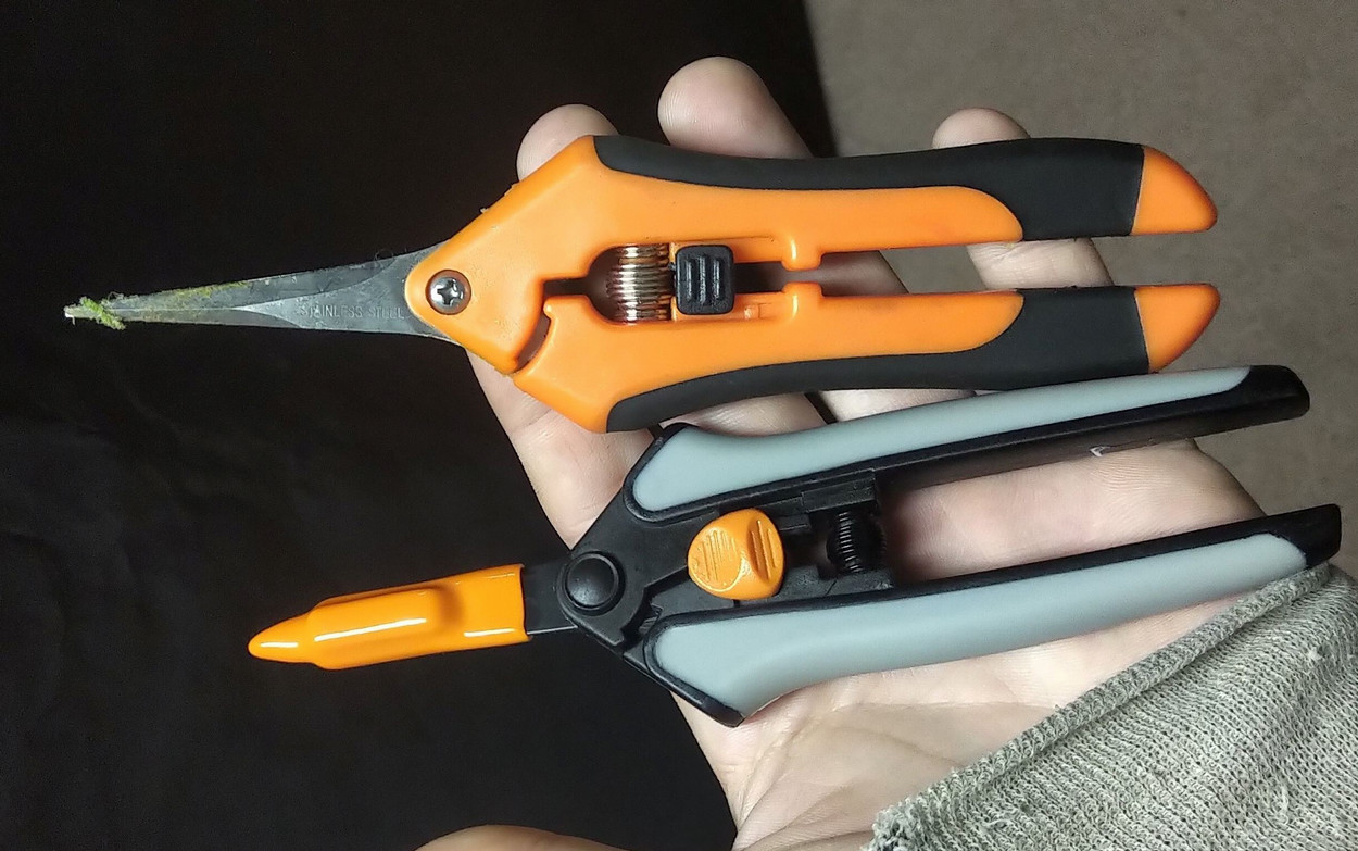 Two pairs of trimming scissors